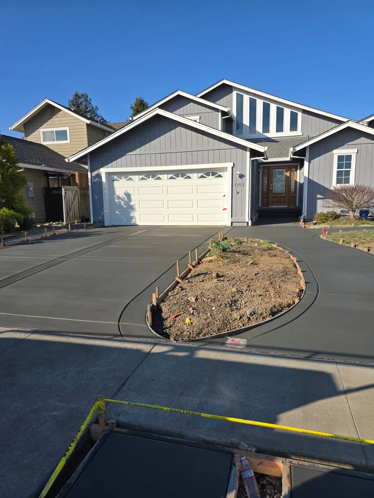 Freshly poured and finished concrete driveway in Murrieta, CA