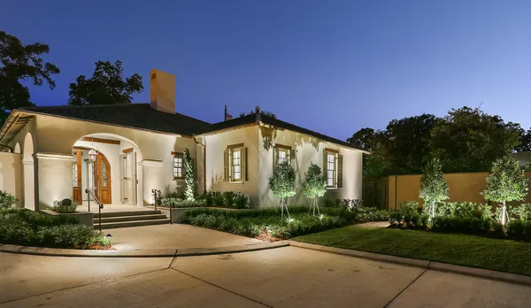 Freshly completed concrete driveway under evening lighting in Murrieta